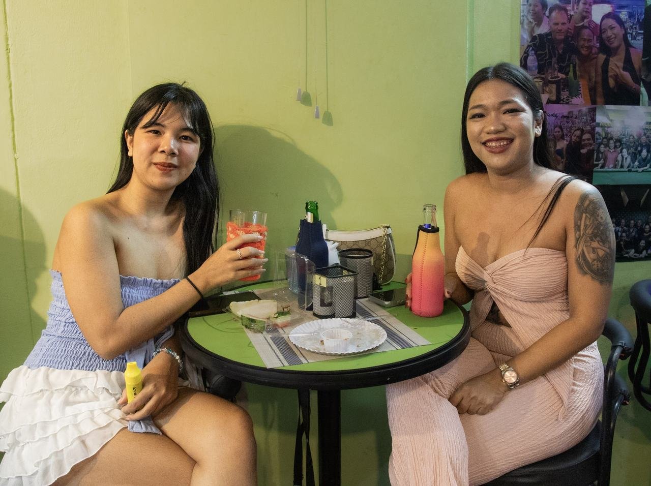 Two friends enjoying drinks at their favorite table