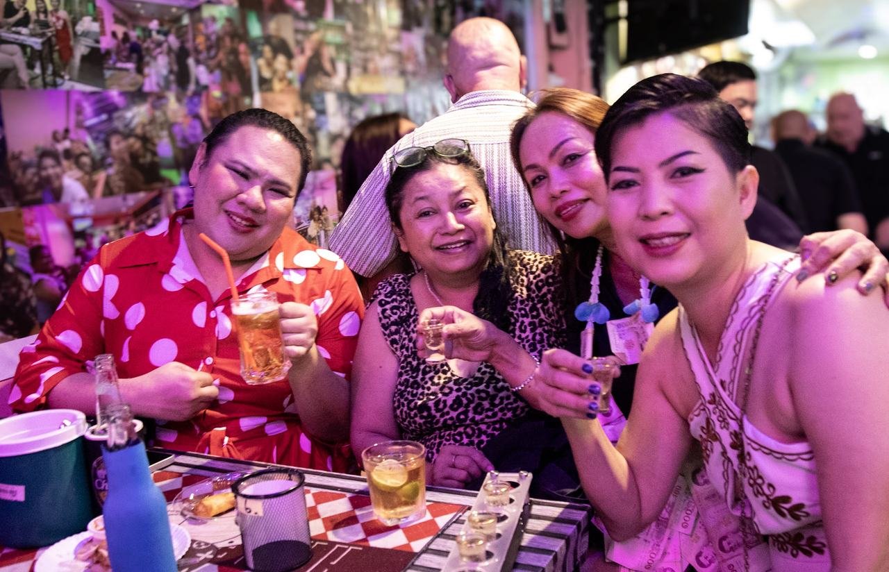 Raising a toast together with the whole gang