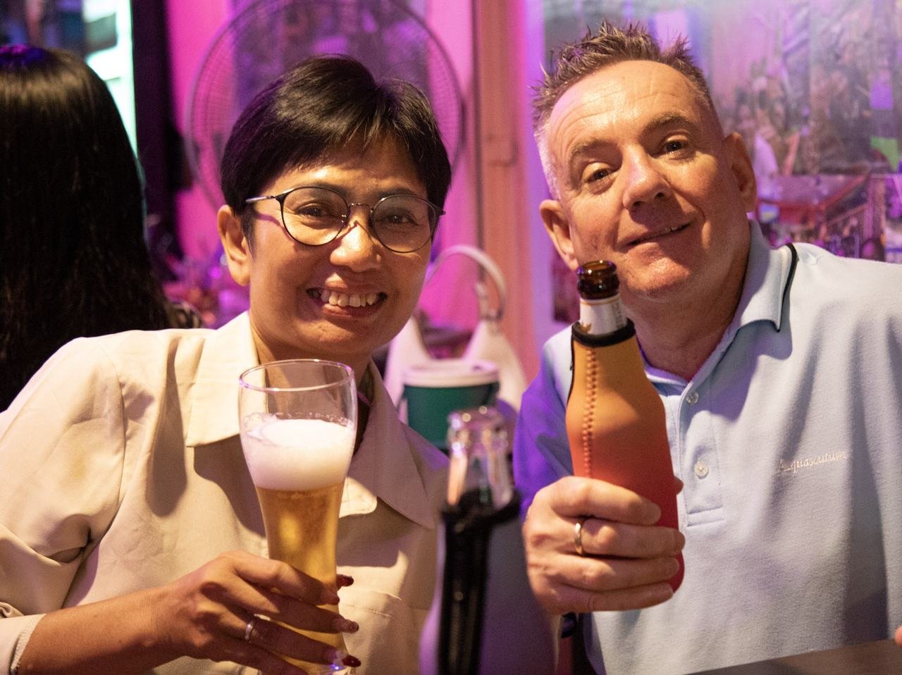 Raising a toast together with drinks in hand