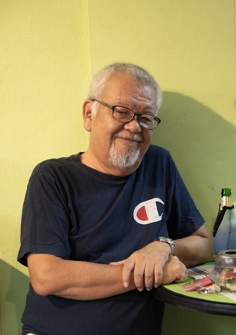 A gentle smile from one of the evening's guests